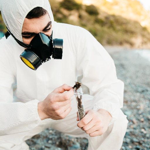 Certified asbestos removal specialist inspecting hazardous material during a remediation project in Denver Colorado